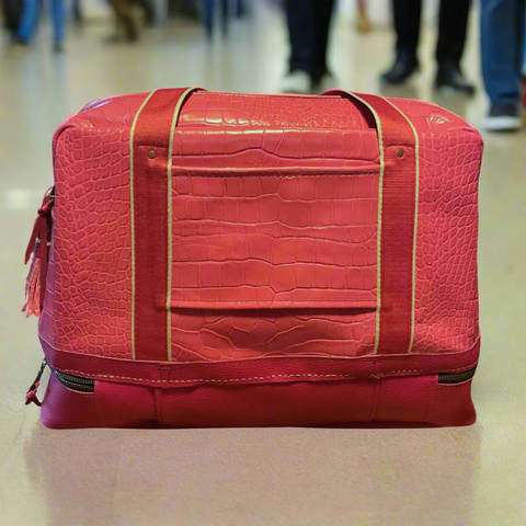 Voyager Travel Bag with luggage sleeve and featuring hand stitching along the bottom compartment