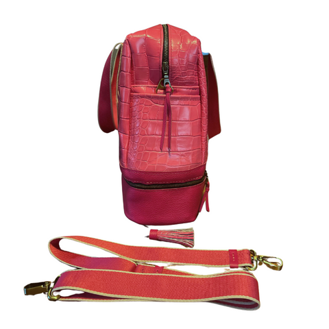 Voyager Travel Bag side view showing exterior pockets and 18 by 12 inch dimensions
