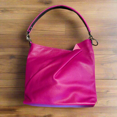 slouchy pink leather tote with folded detail