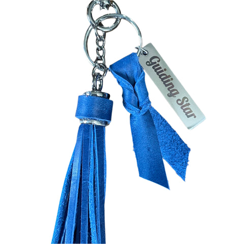 Close-up of twisted leather detail on blue Astral Tassel Keychain