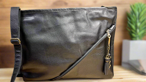Black leather tote bag with custom engraving option