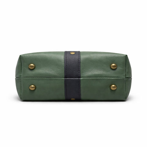 Bottom of lambskin crossbody showing 4 protective purse feet