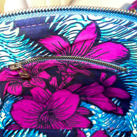 blue and magenta Floral-patterned lining with a zipper pocket