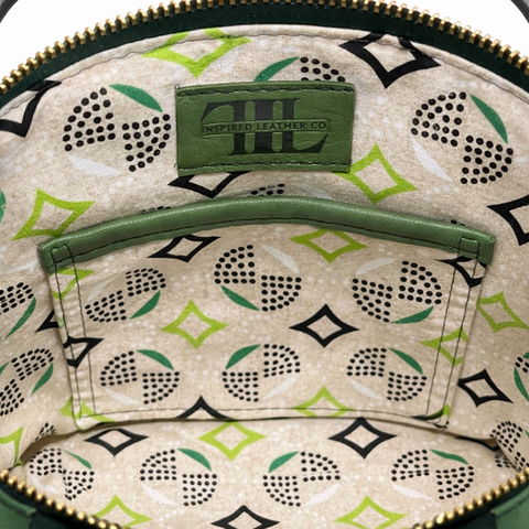 Interior of lambskin crossbody bag showing cotton lining and slip pocket