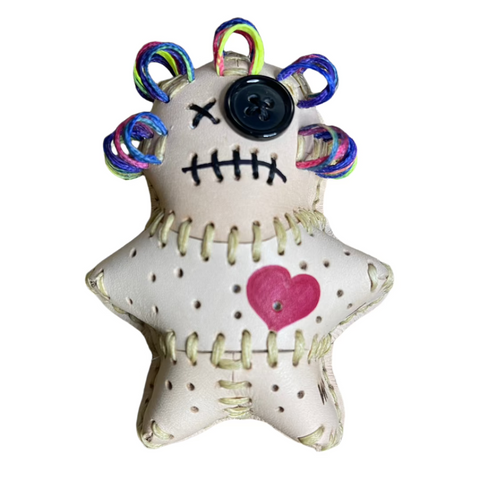 Hand stitched leather voodoo pin cushion doll with purple, pink and neon yellow curly hair